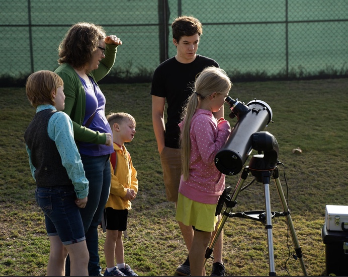 Showing a local Pasadena family the November 11, 2019 Mercury transit through my telescope + solar filter Showing a local Pasadena family the November 11, 2019 Mercury transit through my telescope + solar filter
